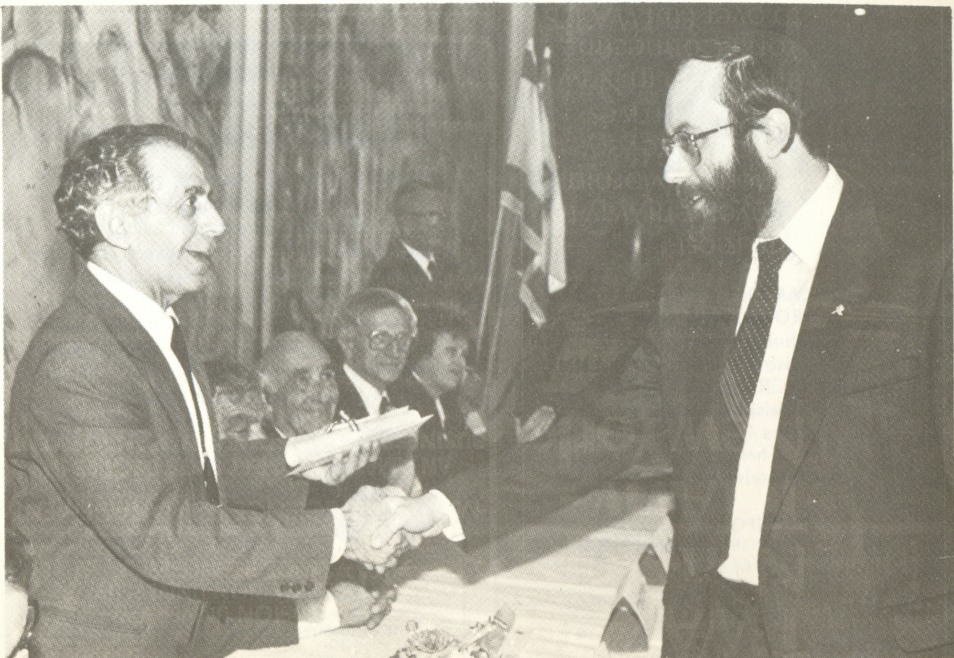 Shlomo Hillel presents Dr. David Applebaum with the knesset's quality of life award ca. 1988